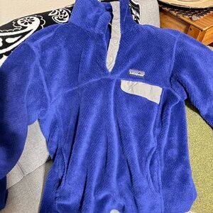Patagonia woman’s size Medium Royal Blue Fleece Pullover